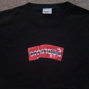 Supreme x Comme Des Garcons